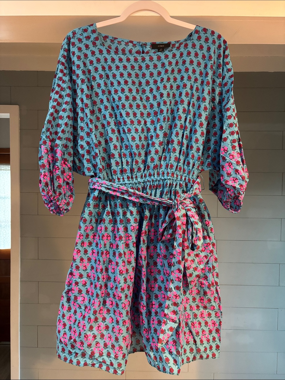 Dolman-sleeve mini dress in layered block print